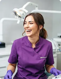Woman dentist laughing